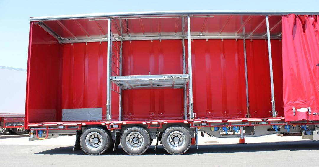 Freighter AutoMezzdeck trailer with red curtains
